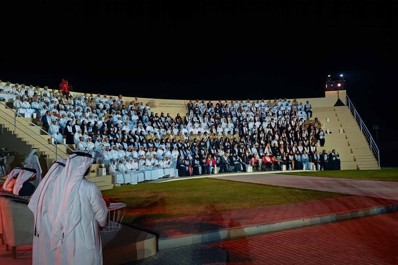 Semicircular bleacher seating at the Graduation Day ceremony in Khorfakkan