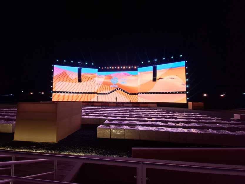 Stage and seating at Liwa Village, Abu Dhabi, at night