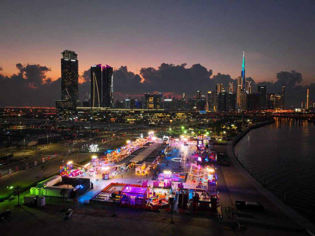 Event site with light towers and LED structures at MOTB, Burj Park, Dubai