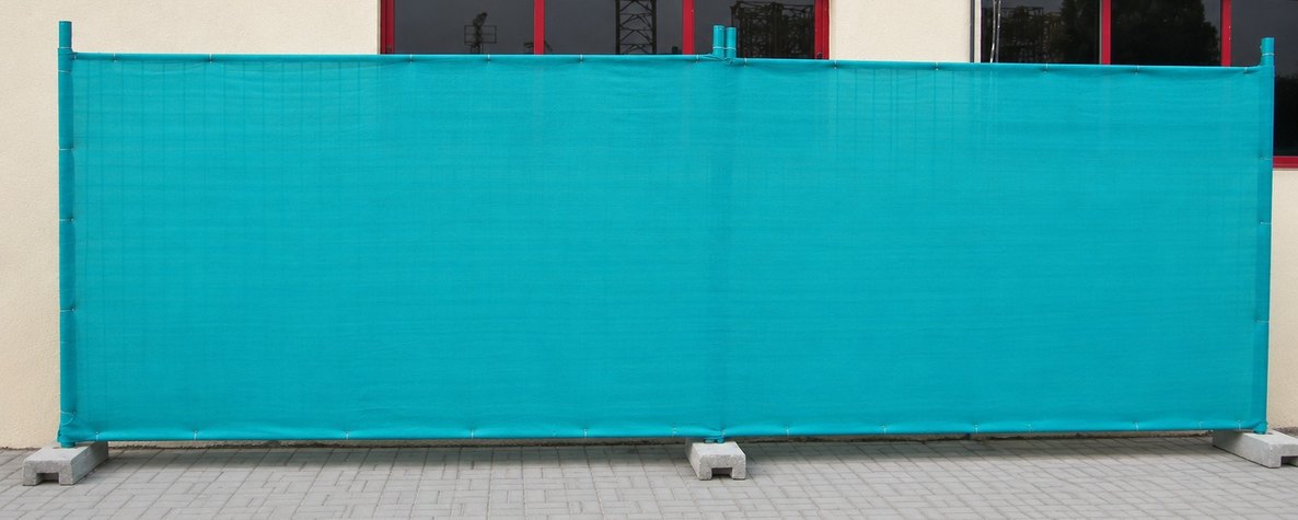 Heras temporary fence panels with shade-cloth infill
